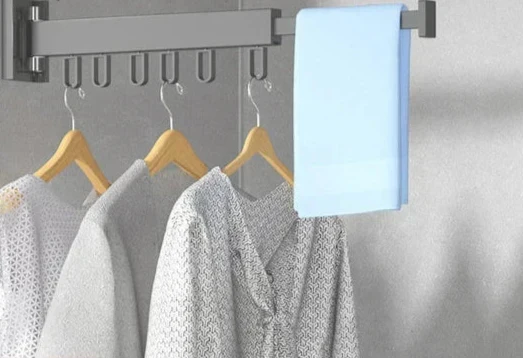 Wall mounted clothes drying rack, space-saving foldable design for laundry rooms & compact living.