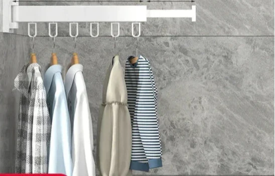 Home organization wall mounted drying rack, space-saving solution for laundry.
