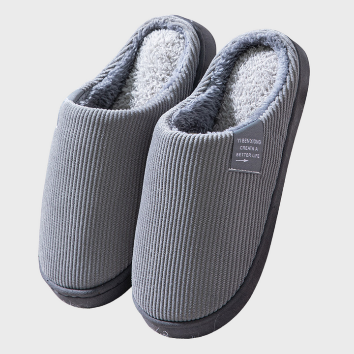 Ribbed fabric women's warm slippers, a comfortable non-slip indoor footwear option.