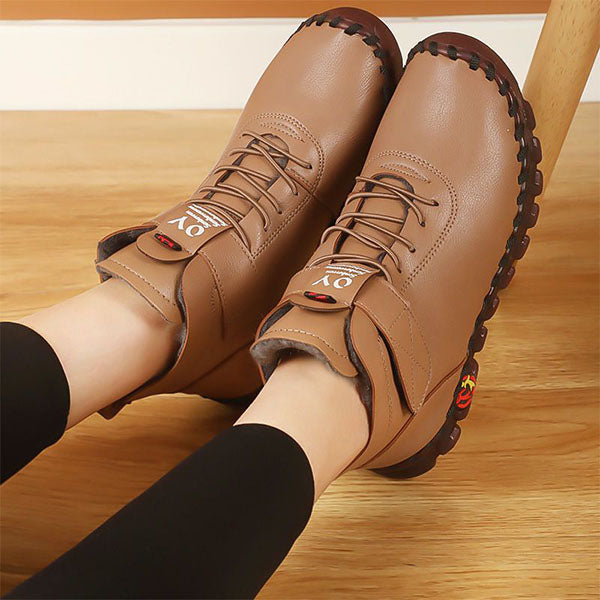 Fashionable high-top snow boots for women, warm and ready for winter.
