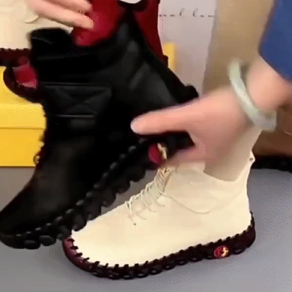 Stylish high-top winter boots for women, designed for snow and icy surfaces.