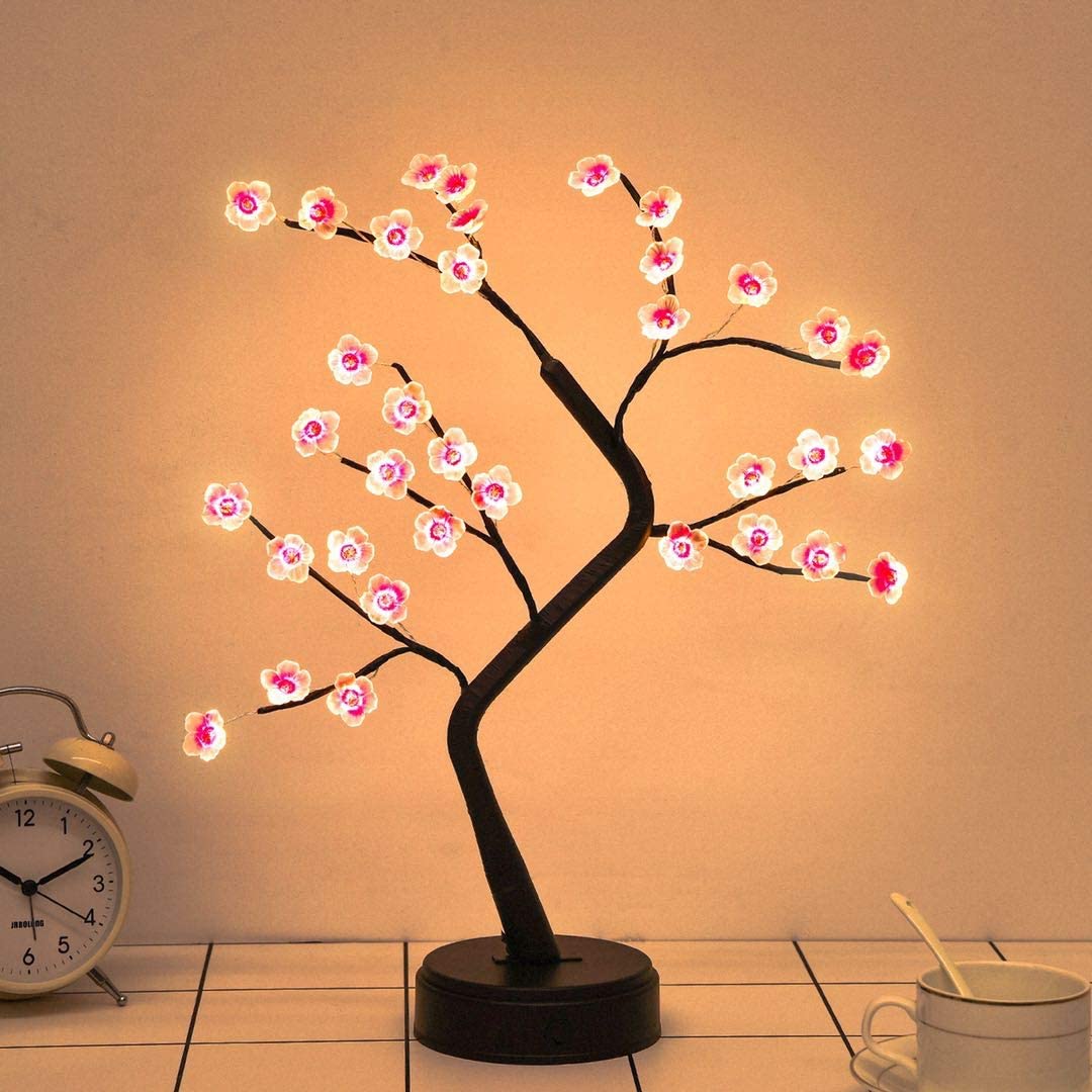 Warm white LED plum blossom tree for enchanting decorative lighting and home decor, LumiPlum.