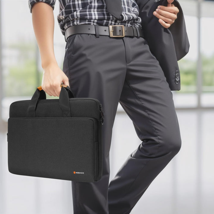 Water-resistant laptop shoulder bag offering 360-degree protection, ideal for work and travel.