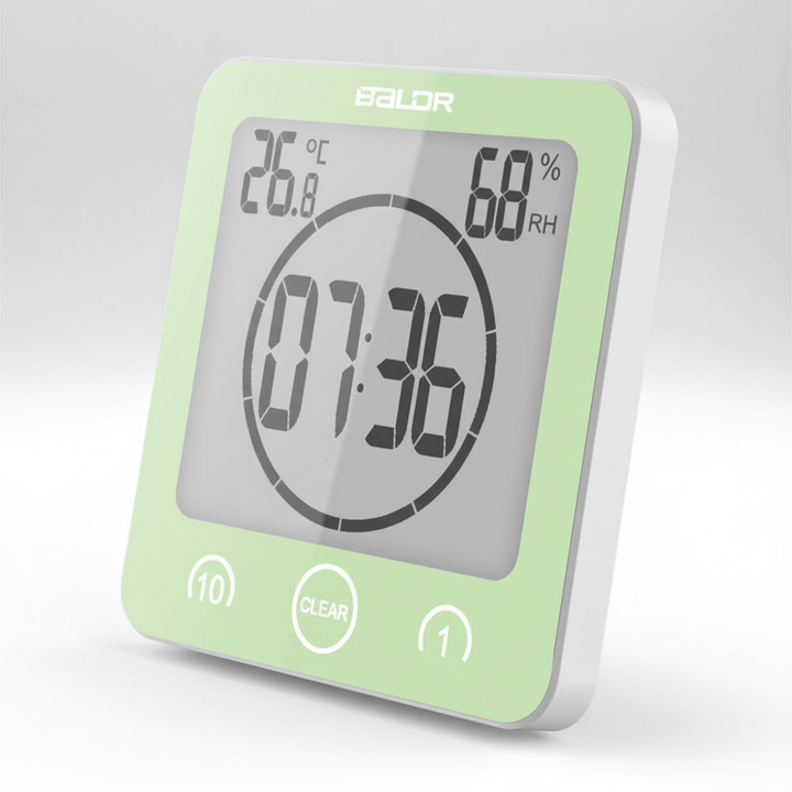 Digital waterproof timer with suction cup attached to a shower wall, promoting energy and water saving habits