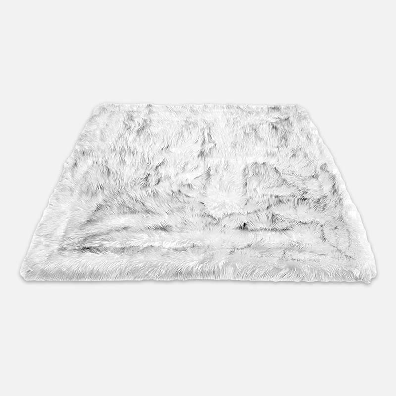 Versatile waterproof pet blanket for large & small dogs and cats. Reversible faux fur/microsuede offers cozy protection.