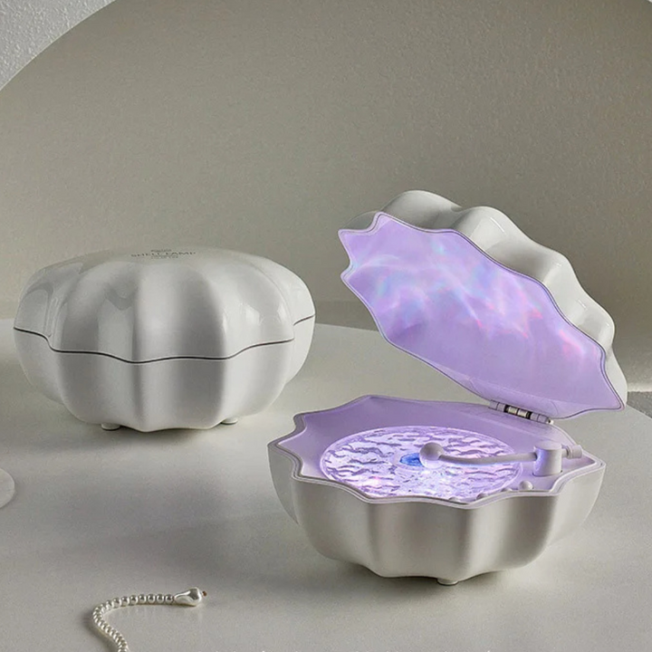 Unique WaveGlow Bluetooth speaker, a decorative sound machine with a glowing wave plate, ideal as a gift.