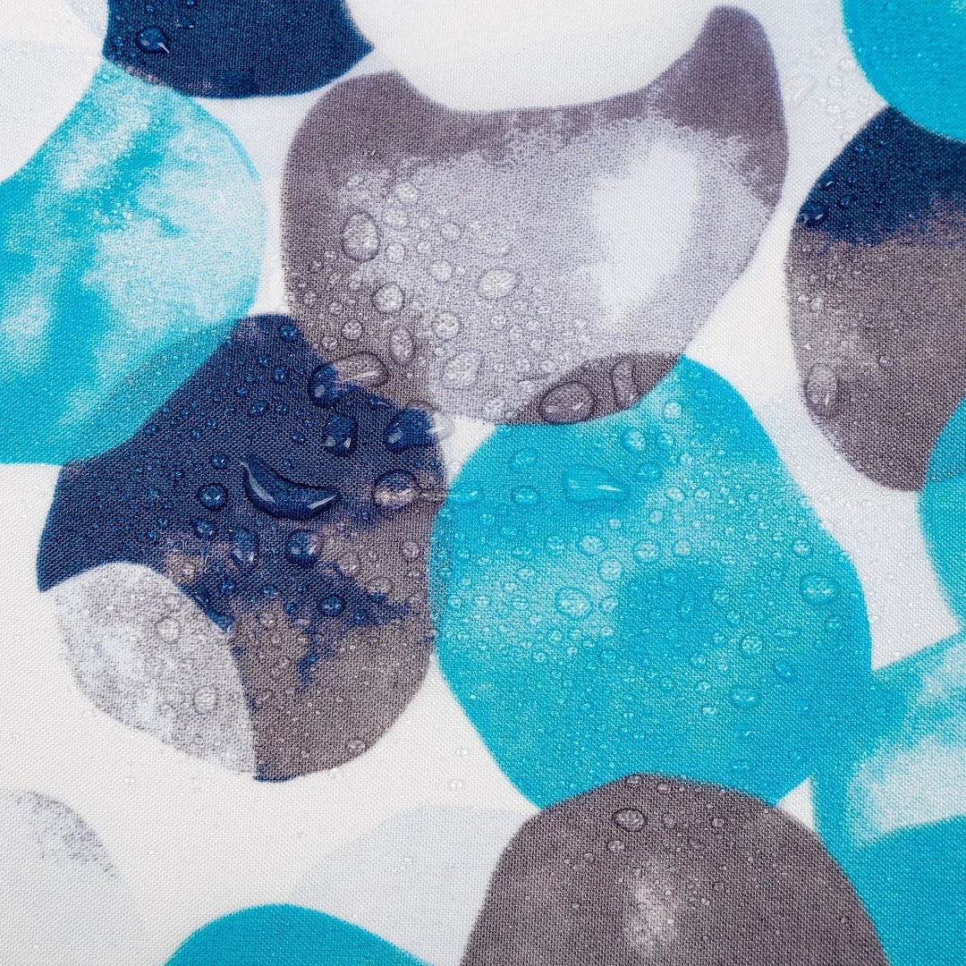 Full view of 'SplashDot' decorative fabric shower curtain installed in a bathroom