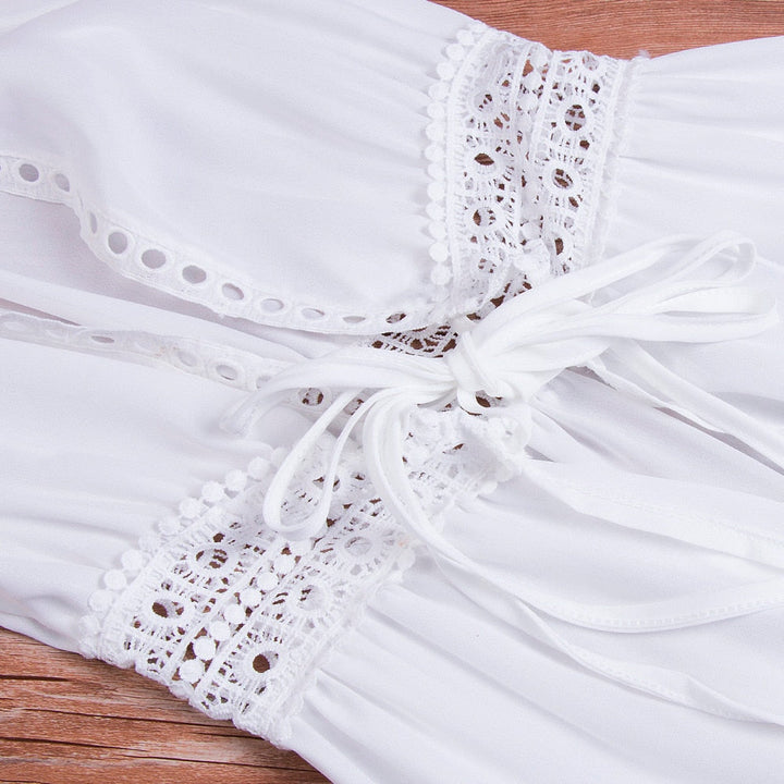 Resort wear women's long dress, white with graceful lace details & a V-neck. Ideal vacation style or beach cover-up.