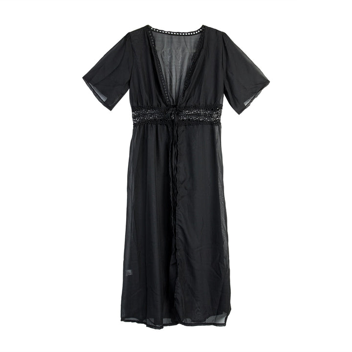 White long women's summer dress with elegant lace trim, a comfortable flowy silhouette, and a chic bow tie back.