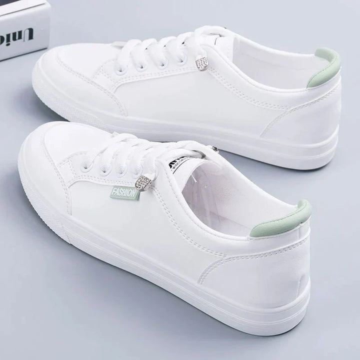 Stylish women's lace-up UrbanEase Low sneakers in white, with orthopedic comfort, great for daily and tennis wear.