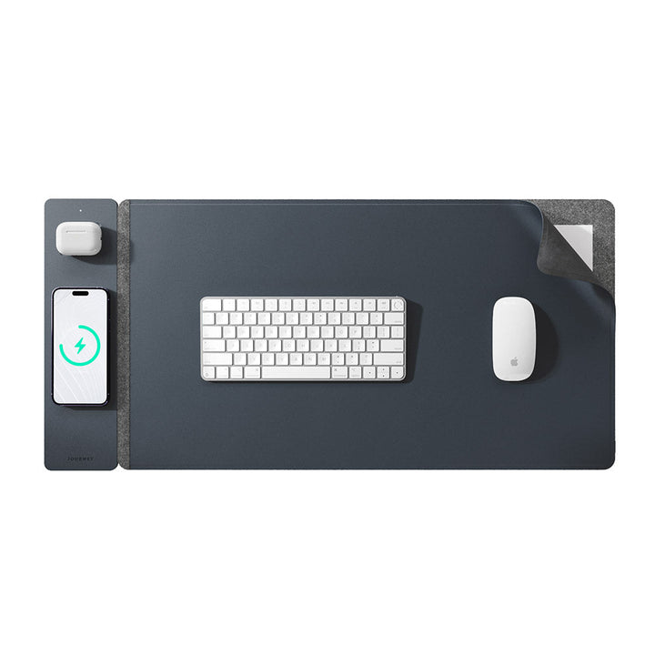 Smart tech gadget: Unisex wireless charging desk mat. Reversible vegan leather & felt. Charges phones & earbuds.