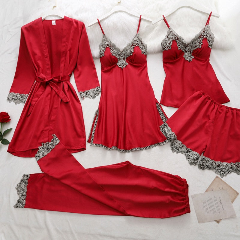Model wearing elegant women's 5-piece satin lace sleepwear set, showcasing luxurious comfort & style.
