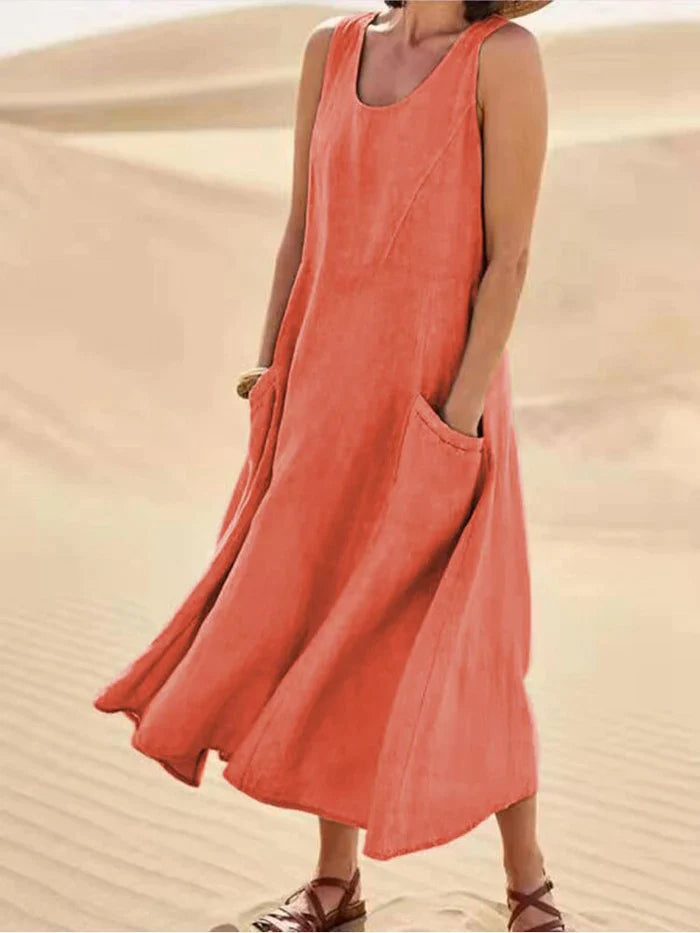 Comfortable linen A-line midi dress for women, featuring a relaxed fit and convenient pockets for all-season wear.