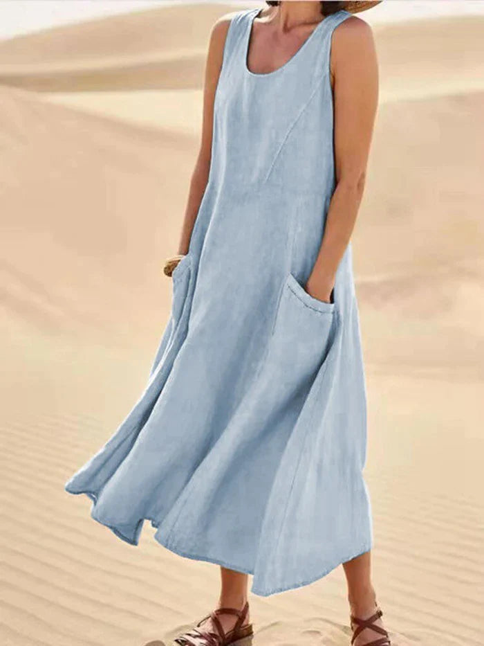 Relaxed fit A-line women's dress in linen, with handy pockets, perfect as a casual summer midi dress for everyday.