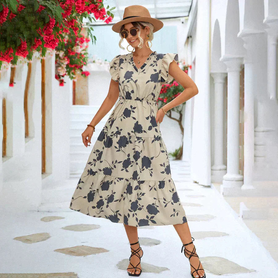 Women's A-line summer midi dress with puff sleeves & color accent for casual or vacation.