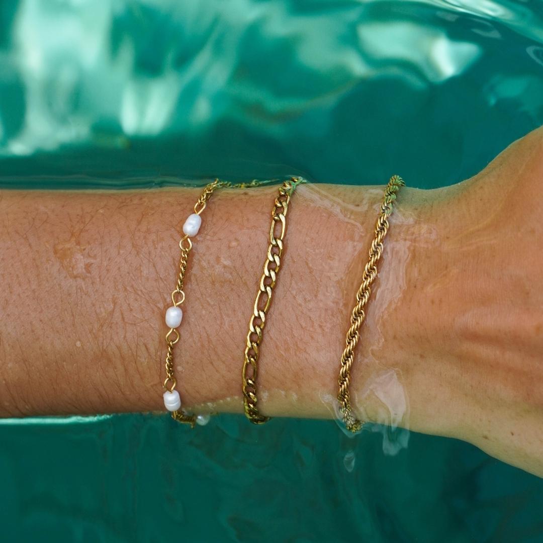 Silver-toned adjustable freshwater pearl bracelet, water resistant and hypoallergenic for women.
