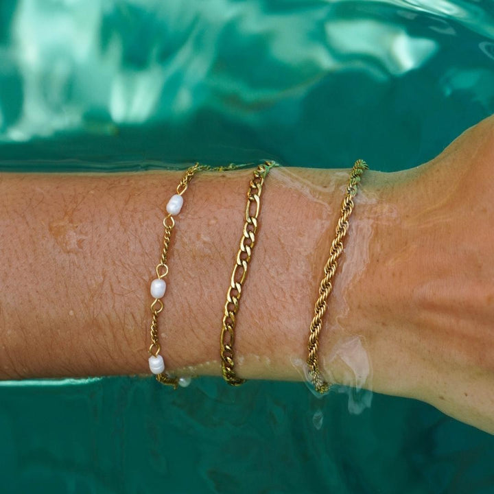Silver-toned adjustable freshwater pearl bracelet, water resistant and hypoallergenic for women.