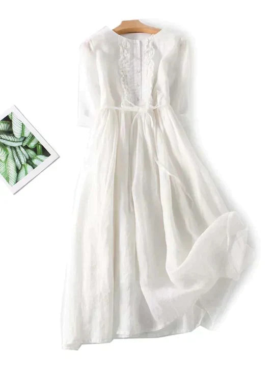 Chic women's round neck loose fit summer dress with short sleeves, ideal for casual, comfortable vacation style.