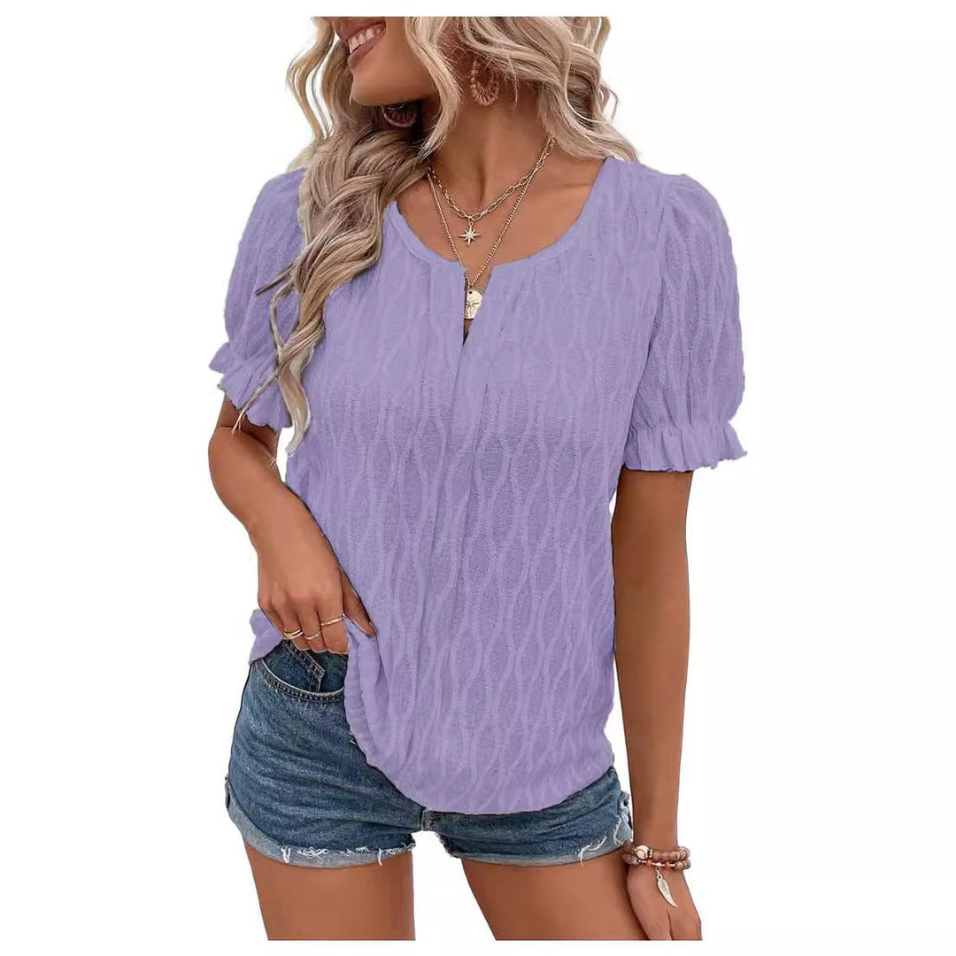 Women's airy puff sleeve blouse with delicate lace accent, perfect for spring casual wear.
