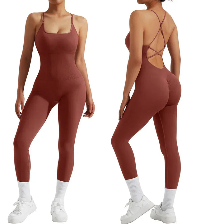 Woman in Nova fitness jumpsuit doing yoga. Comfortable all-season activewear for flexibility & workouts.