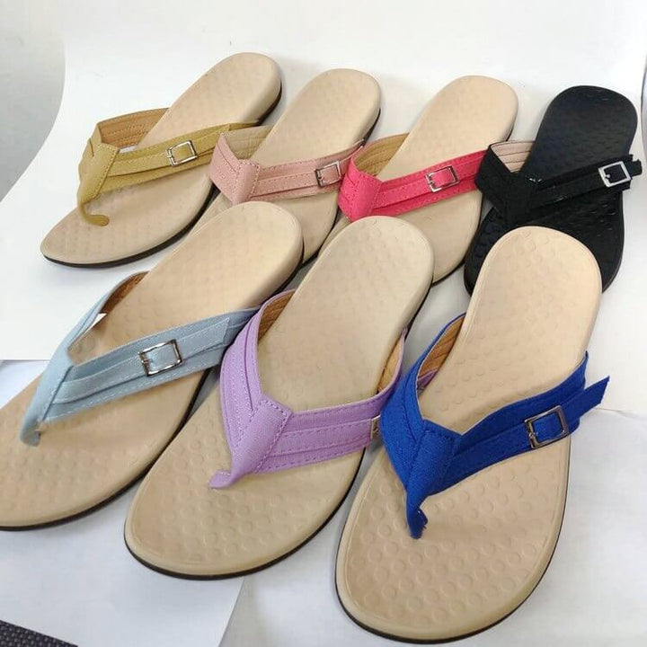 Side view of women's orthopedic sandal, showcasing arch support, open-toe design & comfort.