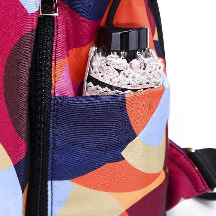 Daily women's backpack, anti-theft & water-resistant, multi-pocket design for secure casual carry.