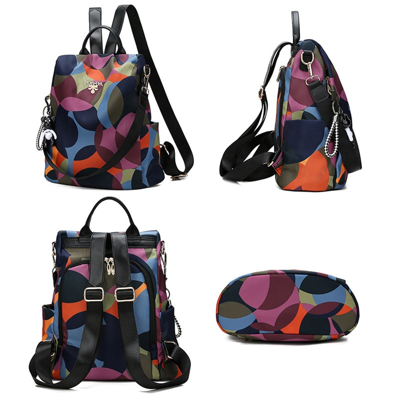 Stylish women's anti-theft backpack in durable oxford fabric with multi-pockets for travel.
