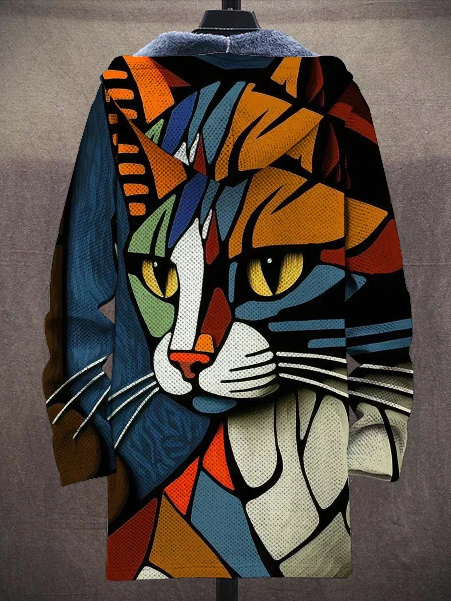 Elegant women's long winter coat with a striking artistic print, offering comfort and unique style.