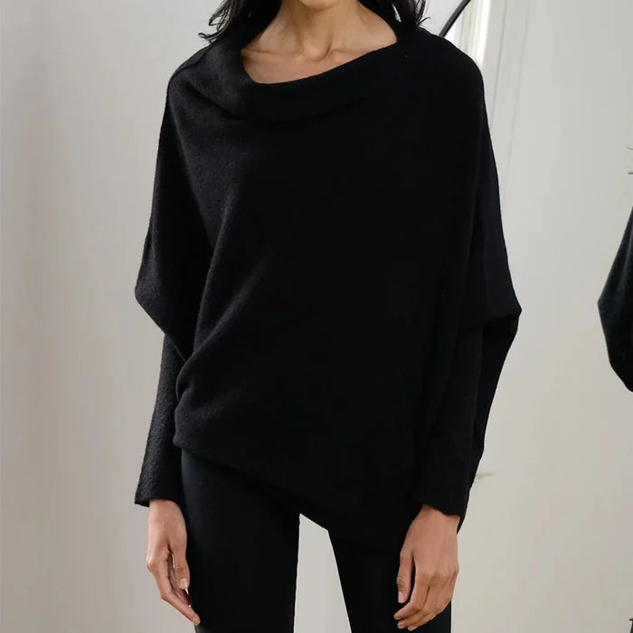 Loose fit women's asymmetric oversized sweater, versatile for comfortable casual or stylish outfits.
