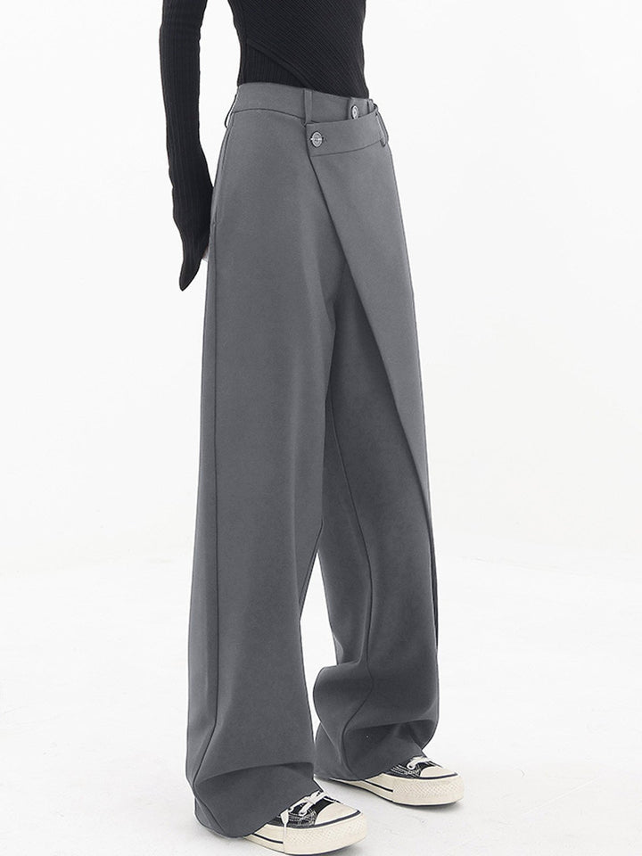 Gray women's comfort wear wide leg trousers, featuring an asymmetrical design and loose fit for modern style.