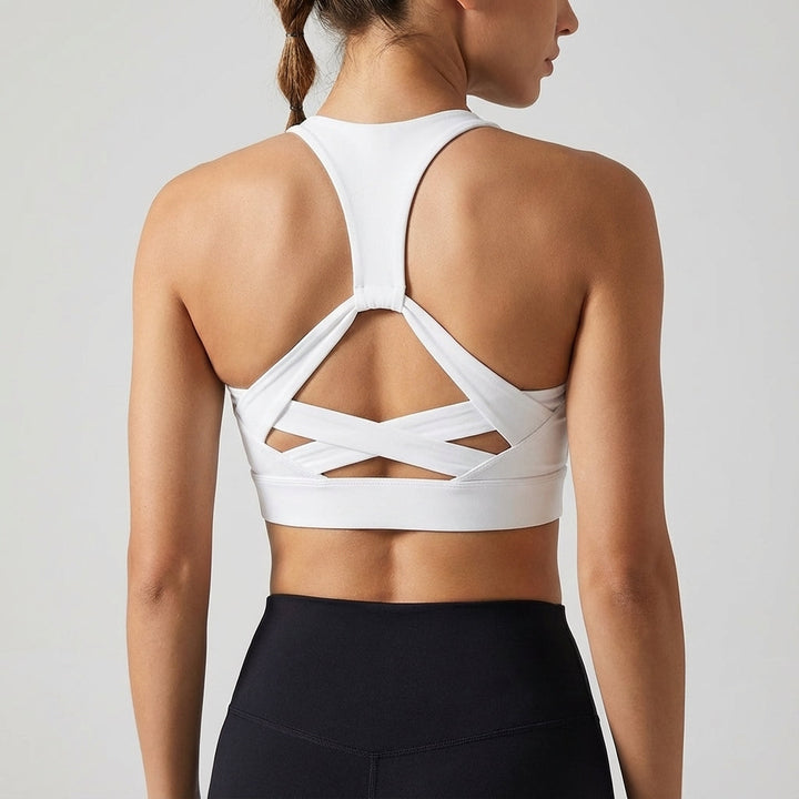 Black 'Kimberly' backless sports top, laced detail, quick-dry activewear, perfect for any workout.