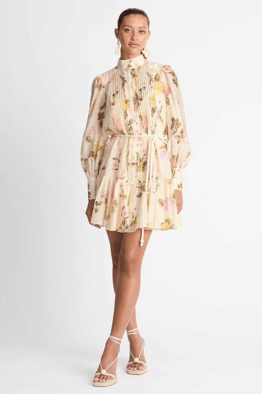 Women's beige floral mini shirt dress with delicate lace trim, perfect for summer casual chic.