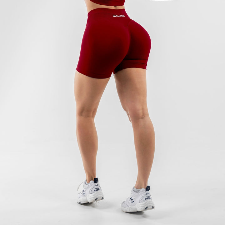 Women's fitness leggings, push-up sports bra, & matching shorts set. Ideal for intense workouts & athleisure.
