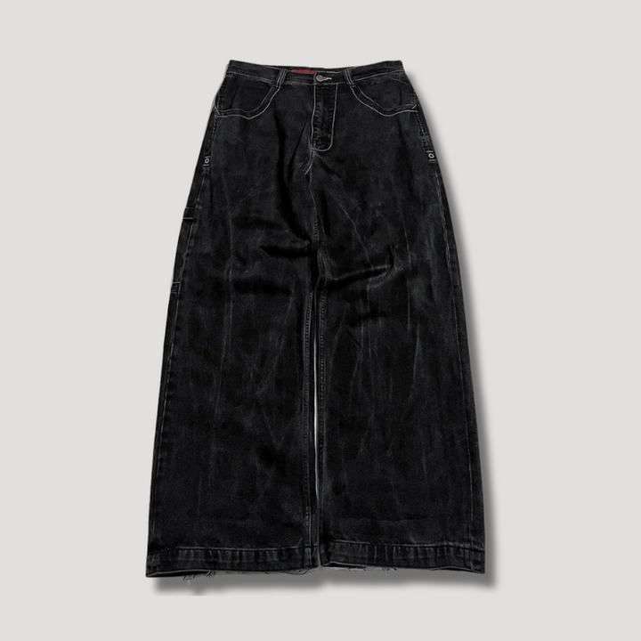Chic black high-waist loose fit baggy jeans for women, '90s retro style denim, great for a streetwear look.