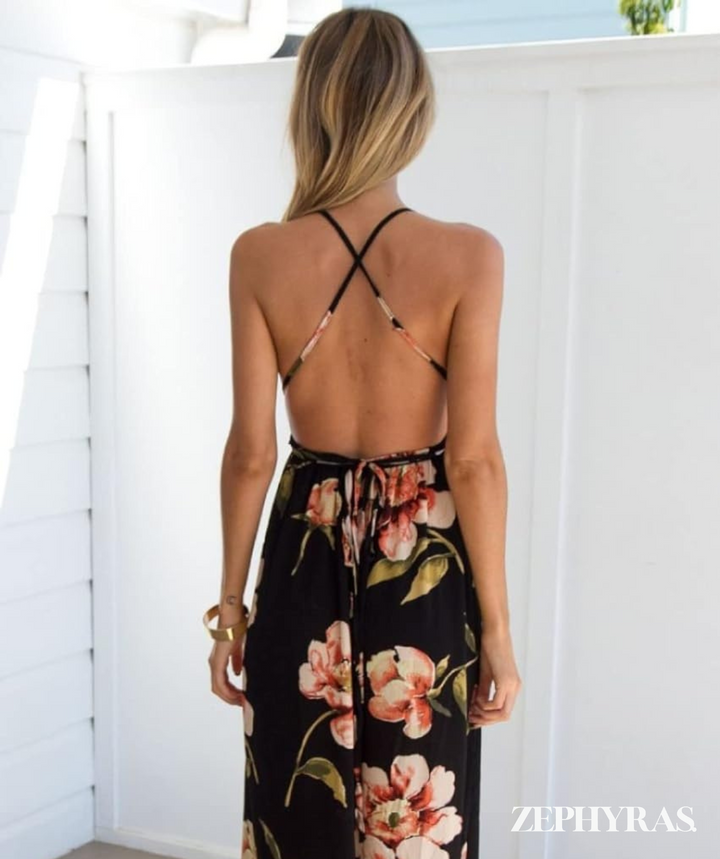 Comfortable loose fit women's black floral maxi dress. Flowy design for stylish summer casual wear.