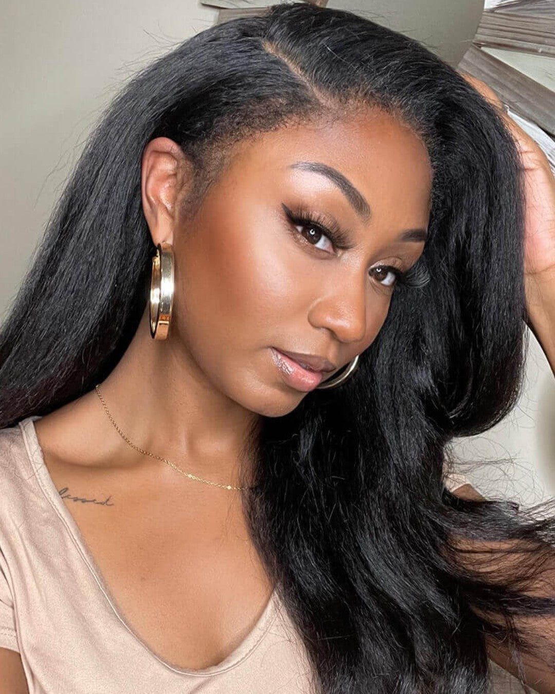 Natural black HD lace wig for women with realistic curly edges, virgin human hair, and full coverage.