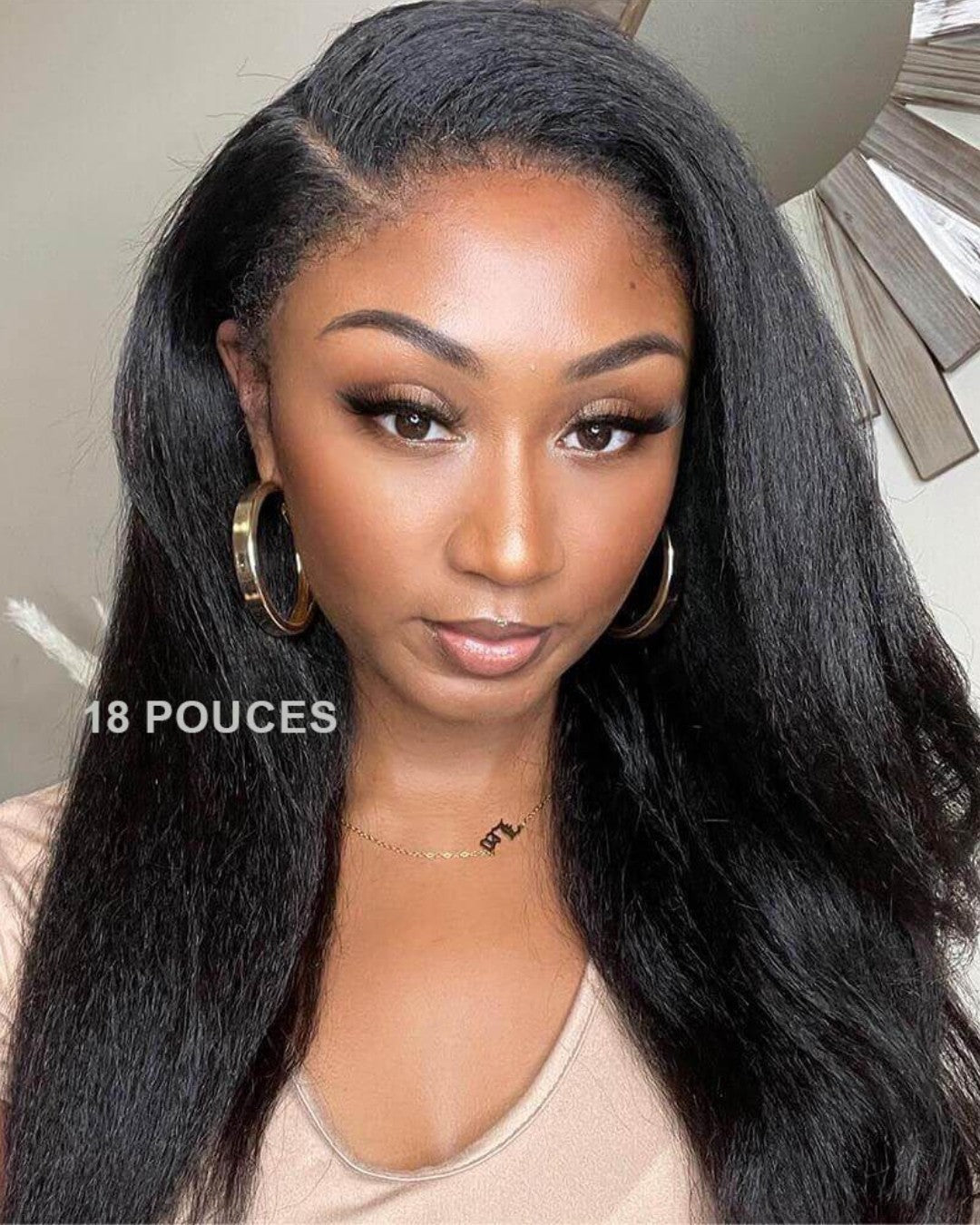 Premium women's HD lace wig in black, with soft natural curly edges and luxurious human hair.