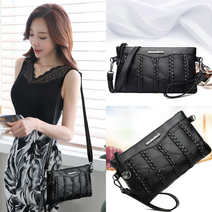 Fashionable women's PU leather clutch handbag, spacious everyday accessory, open interior view
