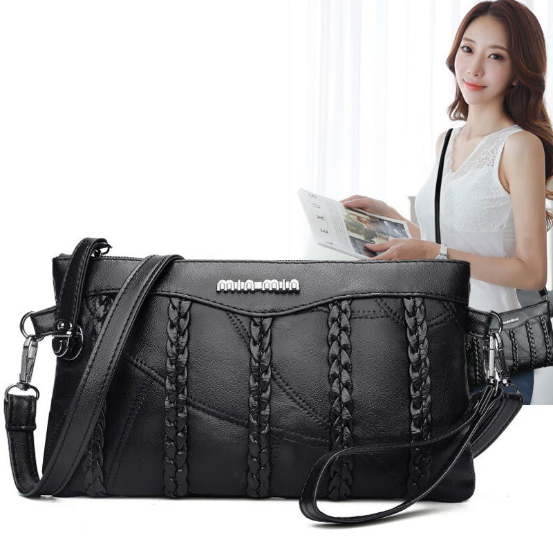 PU leather women's crossbody clutch, sleek design, ideal handbag for essentials, back view
