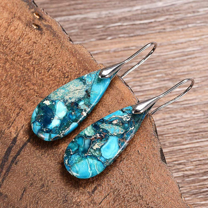 Elegant blue jasper teardrop earrings for women. Natural stone fashion accessory for inner strength. Gift idea.