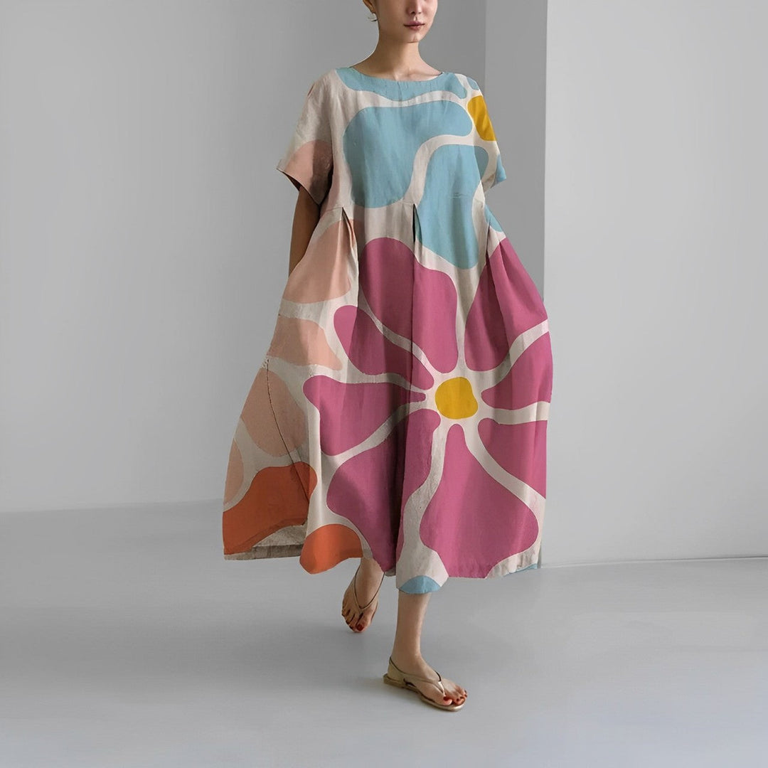 Women's boho floral maxi dress, perfect for summer vacation. Flowy and elegant, ideal beach wear.