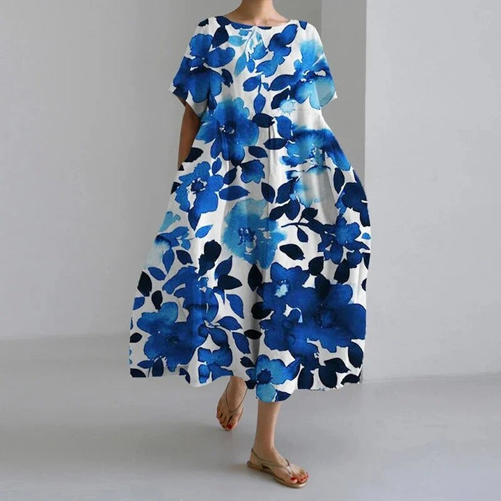 Long floral print boho dress for women. A versatile and elegant summer dress, perfect for beach or casual wear.