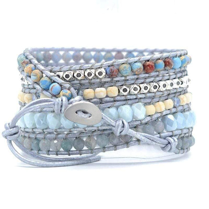 Hand-wrapped women's bracelet featuring blue topaz, imperial jasper, and agate for healing