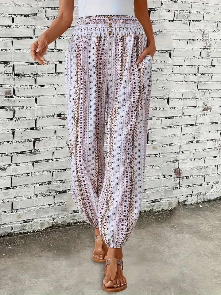 Relaxed fit women's boho pants with a colorful print, high-waisted design & comfortable smocked waist.