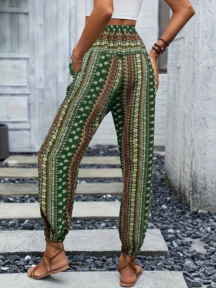 Vibrant printed high-waist boho pants, essential for women's vacation outfits & relaxed summer days.