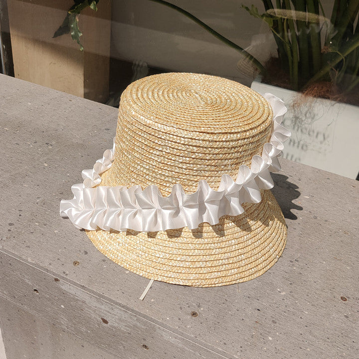 Women's summer bucket hat: striped, braided straw. Great for sun protection & fashion