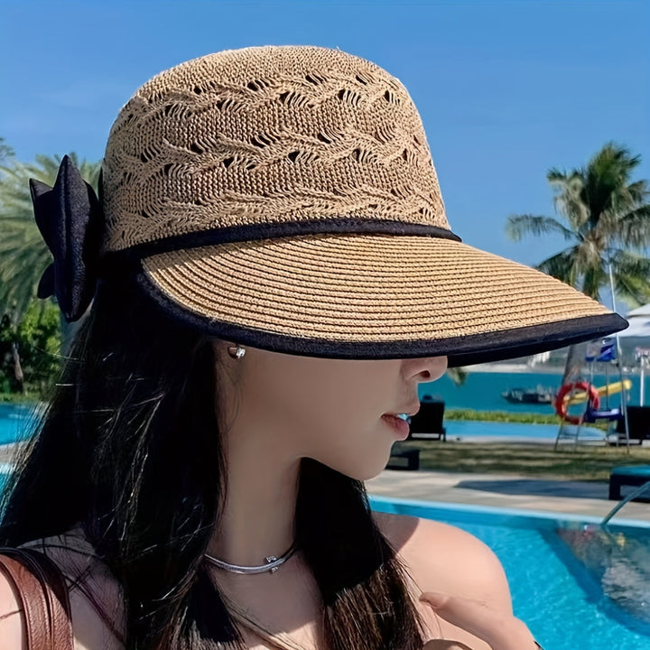 Foldable women's travel hat, braided for durability, with an elegant bow, a must-have summer accessory.