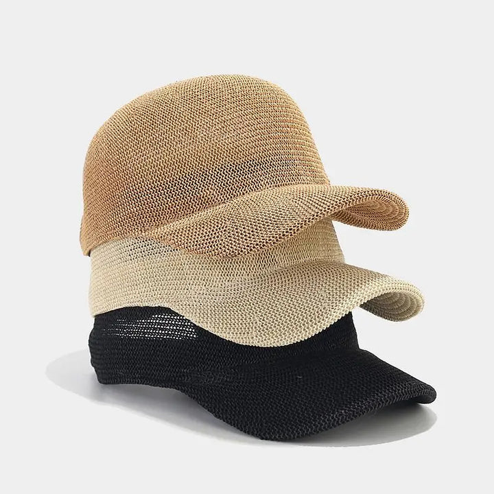 Women's braided wide brim sun hat for summer, offering stylish UV protection.
