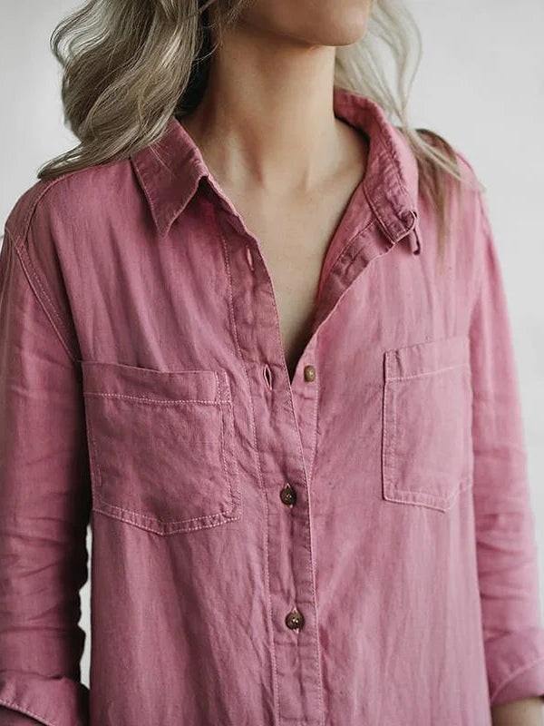 Women's one-piece jumpsuit in a relaxed fit, featuring a full button-front and essential pockets.
