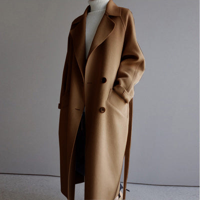 Practical yet stylish women's woolen long coat for comfortable fall and winter outerwear.